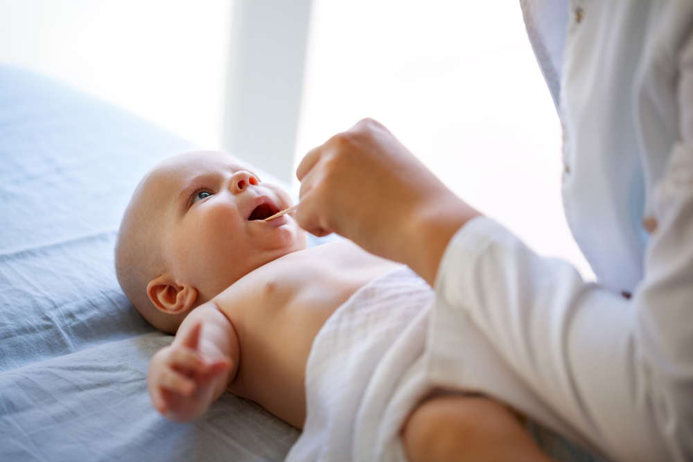 white-bumps-in-the-mouth-can-it-be-early-teething